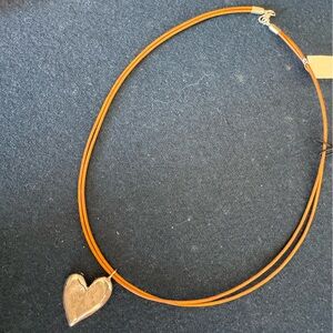 Chic and Uniqurle Sterling Silver Heart Pendant on Brown cord Necklace-no rash!